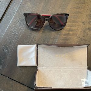 Gucci sunglasses worn once. They are a brown gradient color.